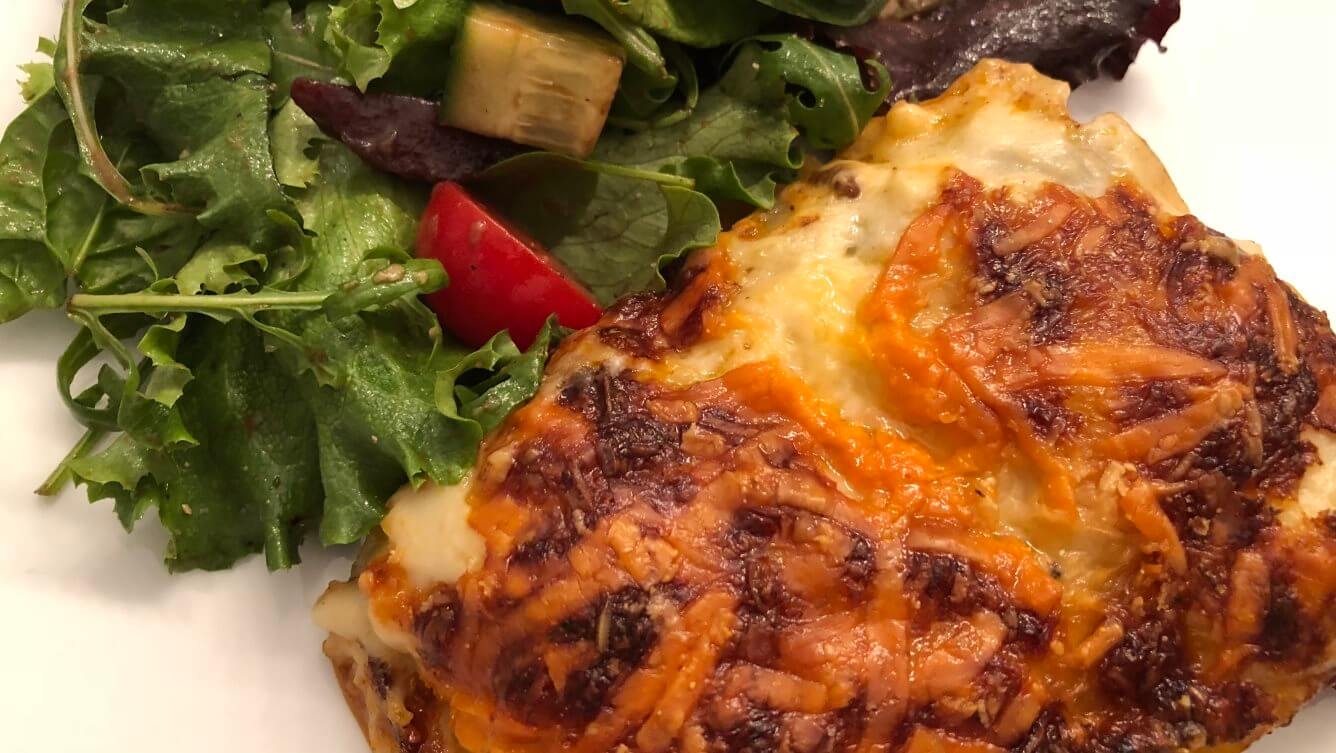 Lasagne, served up with a salad dressed simply with olive oil and balsamic vinegar